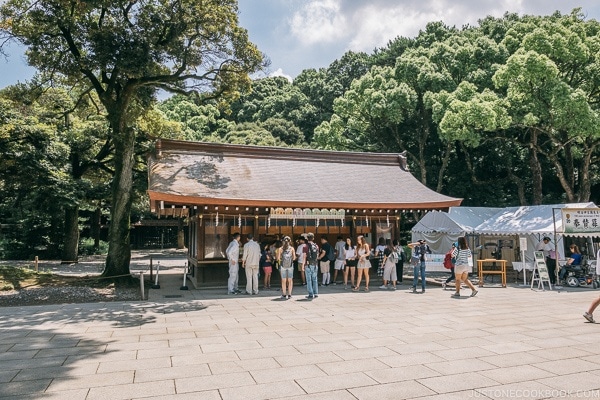 people buying prayer goods and charms - Meiji Jingu Guide | justonecookbook.com