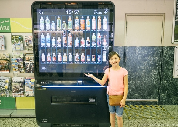 Just One Cookbook children in front of digital drink vending machine - Shinjuku Travel Guide | justonecookbook.com