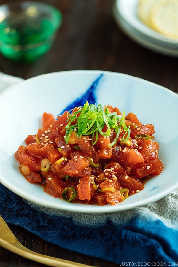 Spicy Tuna served in a bowl with scallion on top.