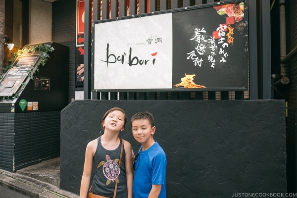 Just One Cookbook children in front of Bonbori Shibuya - Tokyo Shibuya Travel Guide | www.justonecookbook.com