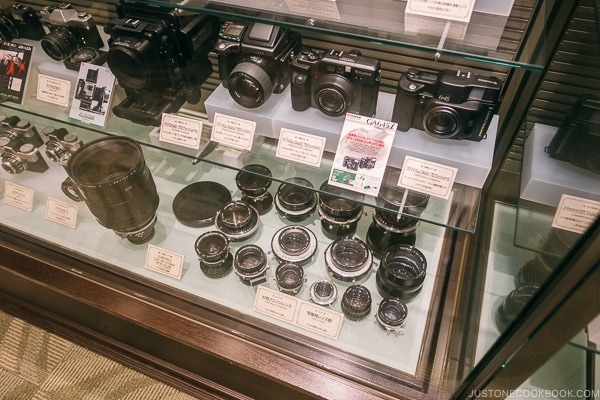 vintage camera and lenses on display at Fujifilm Square Tokyo Midtown - Tokyo Roppongi Travel Guide | www.justonecookbook.com