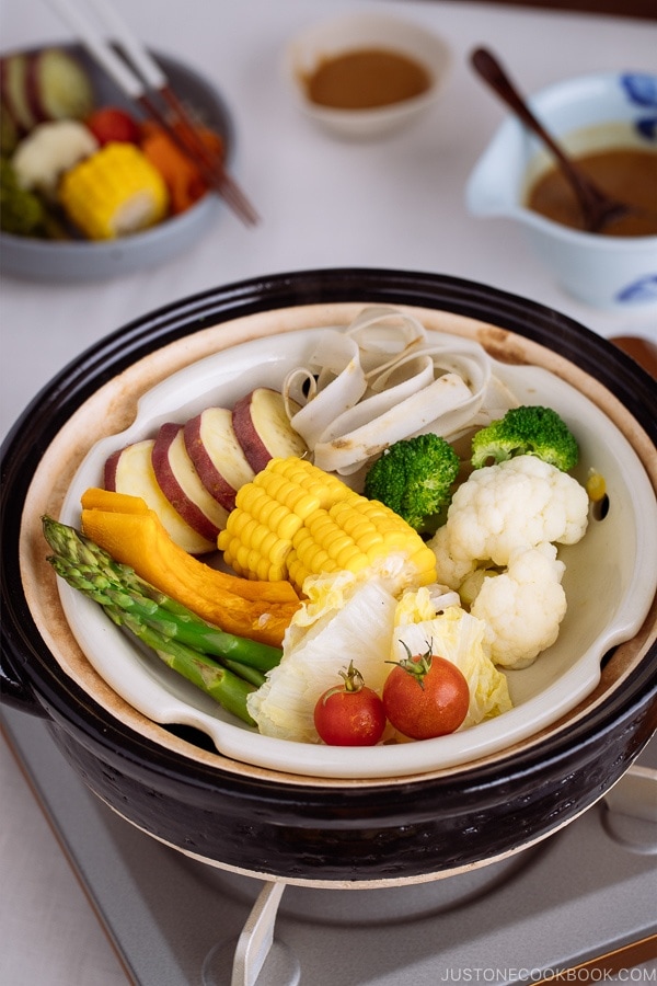 Steamed vegetables in a Japanese earthenware pot, donabe.