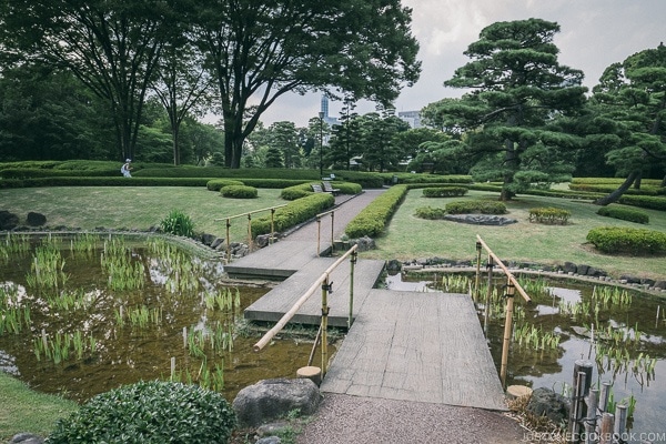 walkway crossing a small pond at ninomaru garden - The East Gardens of the Imperial Palace Guide | www.justonecookbook.com