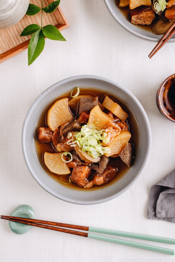 A grey dish containing Japanese beef tendon stew.