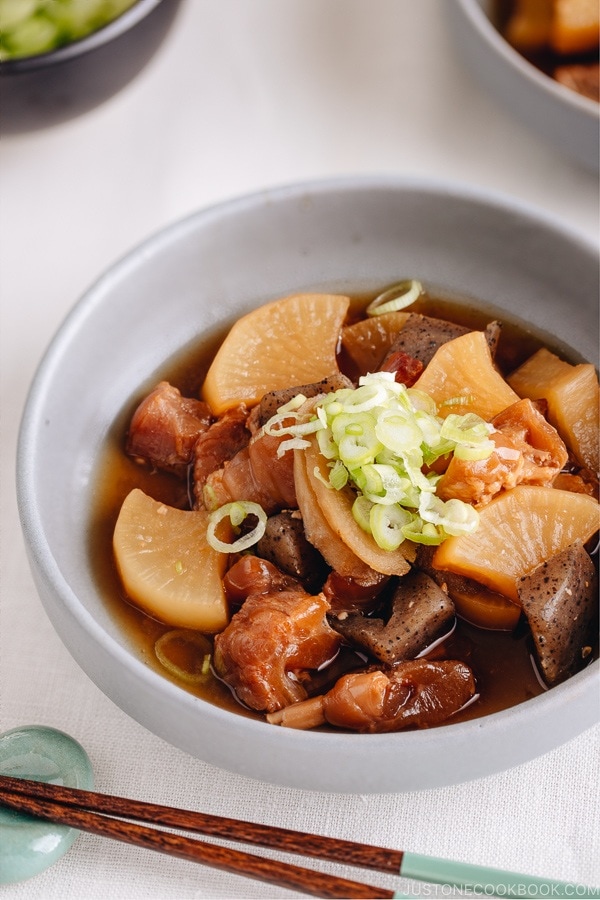 A grey dish containing Japanese beef tendon stew.