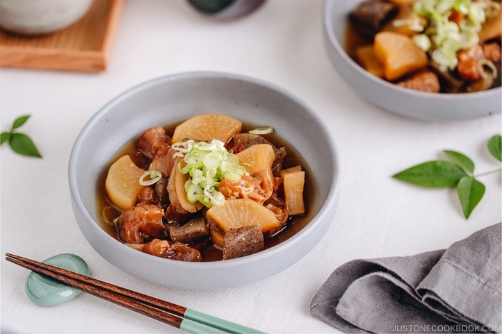 A grey dish containing Japanese beef tendon stew.