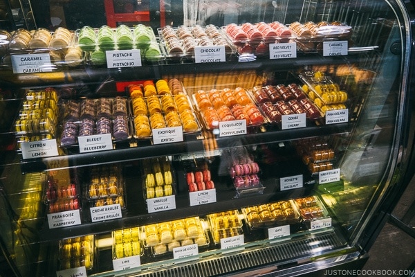 macaron and egg tart stand at Marche Jean-Talon - Montreal Travel Guide | www.justonecookbook.com