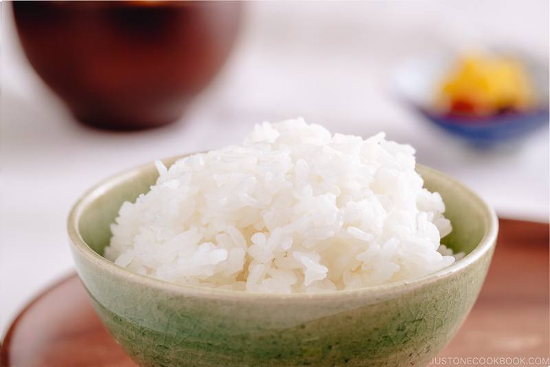 Perfectly cooked rice served in a rice bowl along with miso soup.