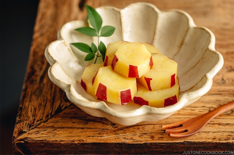 Fluted bowl containing Simmered Japanese Sweet Potatoes with Lemon.