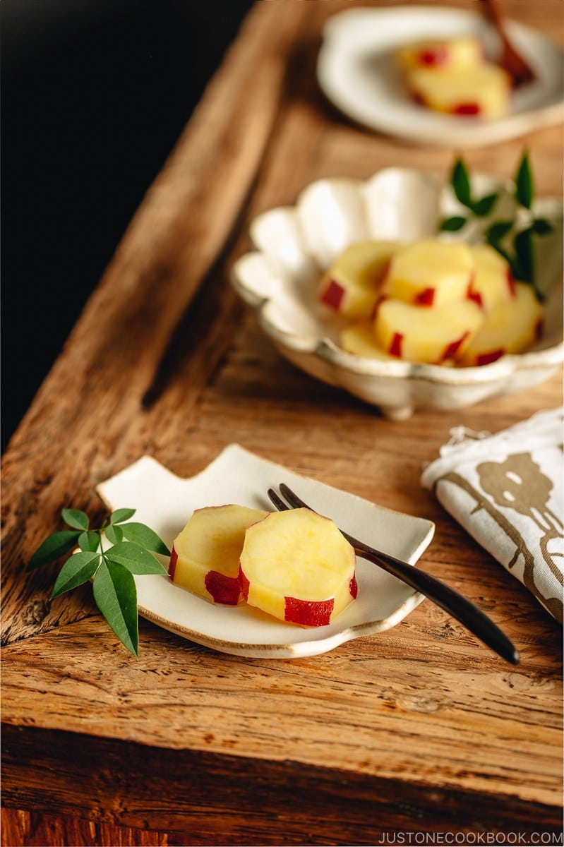 Fluted bowl containing Simmered Japanese Sweet Potatoes with Lemon.