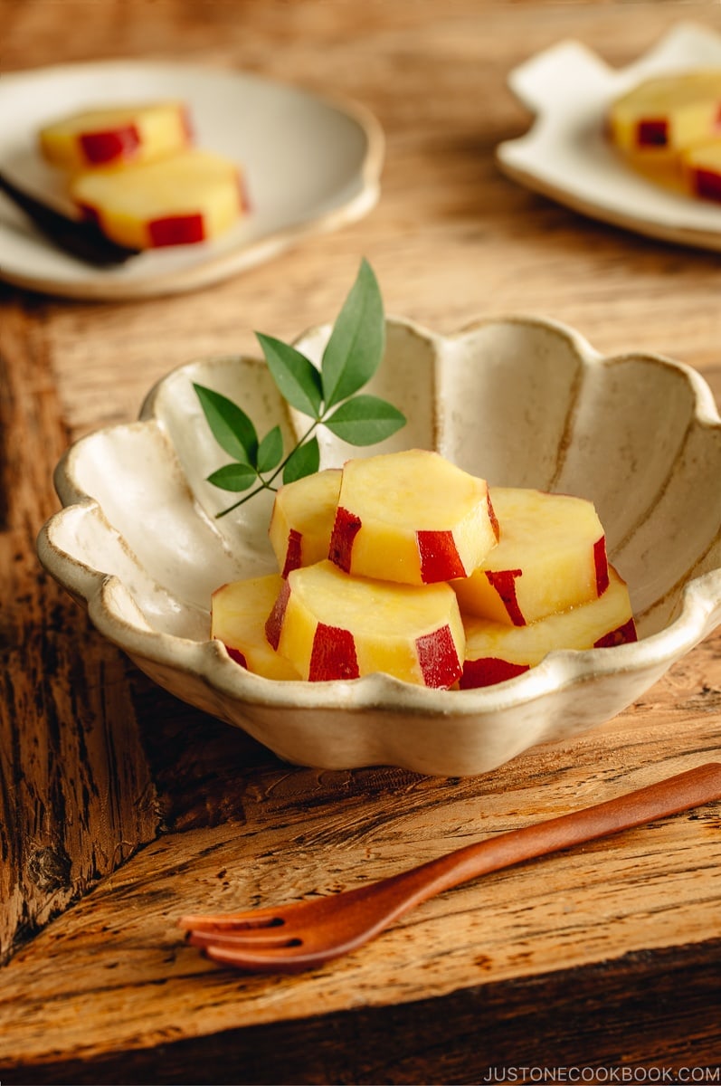 Fluted bowl containing Simmered Japanese Sweet Potatoes with Lemon.