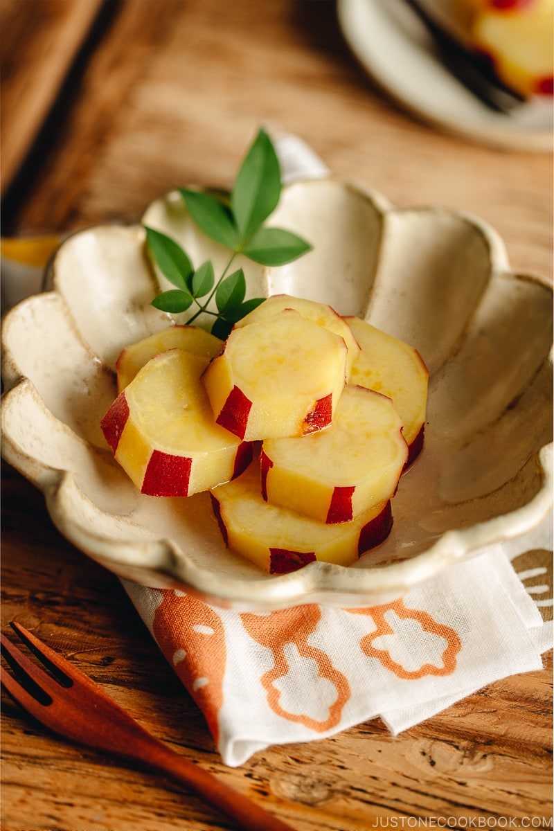 Fluted bowl containing Simmered Japanese Sweet Potatoes with Lemon.