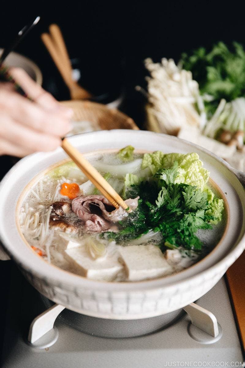 Stir the well-marbled shabu shabu beef in a kombu dashi broth.