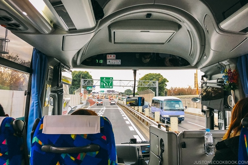 looking through the bus windshield at the freeway ahead - Hakuba Travel and Ski Guide | www.justonecookbook.com