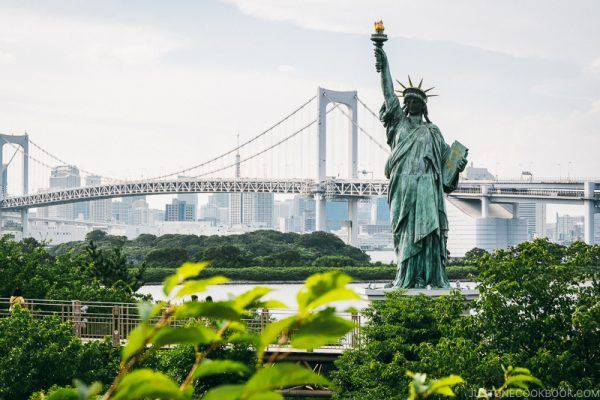 view of Odaiba Statue of Liberty and Rainbow Bridge - Tokyo Odaiba Travel Guide | www.justonecookbook.com
