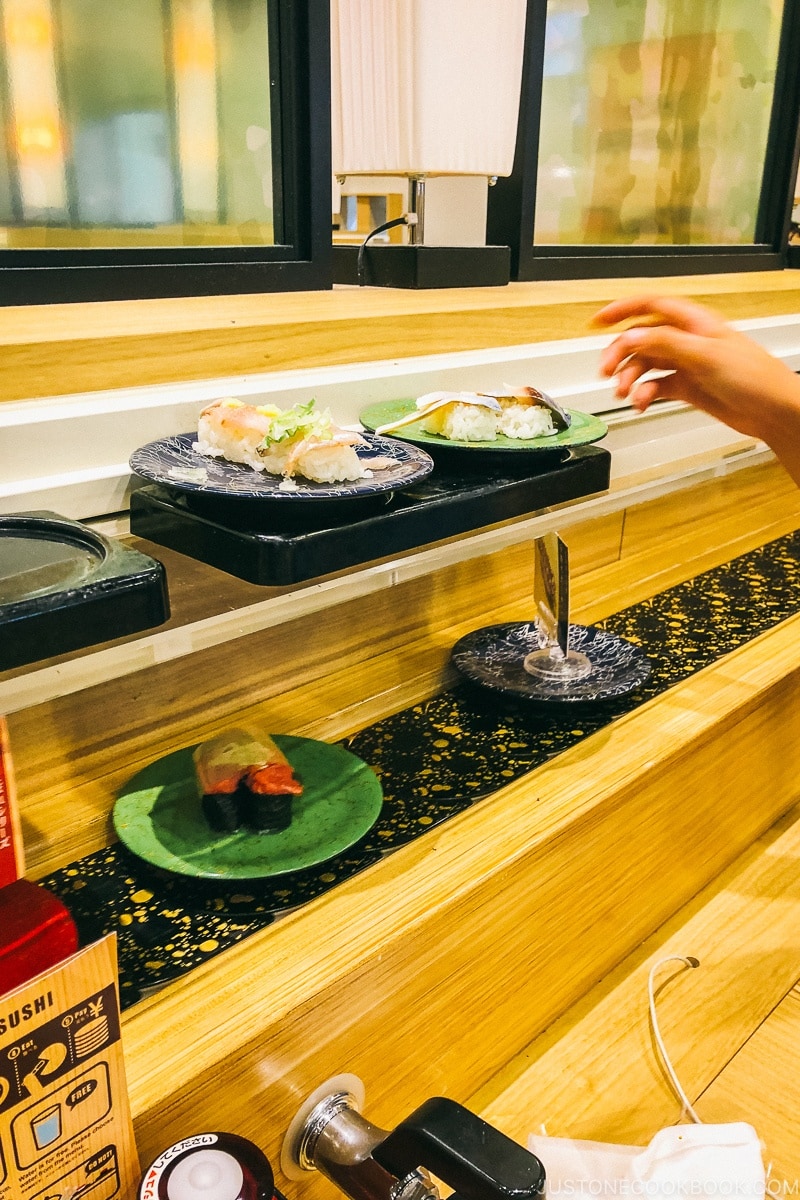 sushi on conveyer belt at Toppi Sushi Venus Fort - Tokyo Odaiba Travel Guide | www.justonecookbook.com
