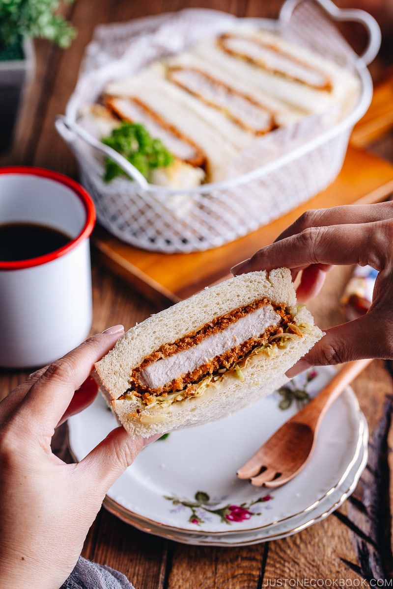 Katsu Sando held between hands and about to be enjoyed.