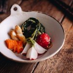 Carrot, radish, and garlic misozuke (miso pickles) in a white ceramic.