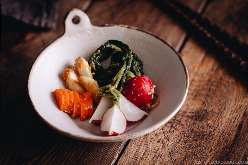 Carrot, radish, and garlic misozuke (miso pickles) in a white ceramic.