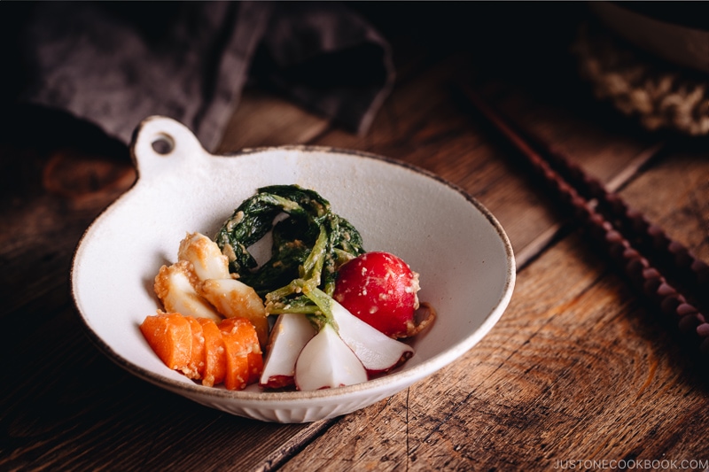 Carrot, radish, and garlic misozuke (miso pickles) in a white ceramic.