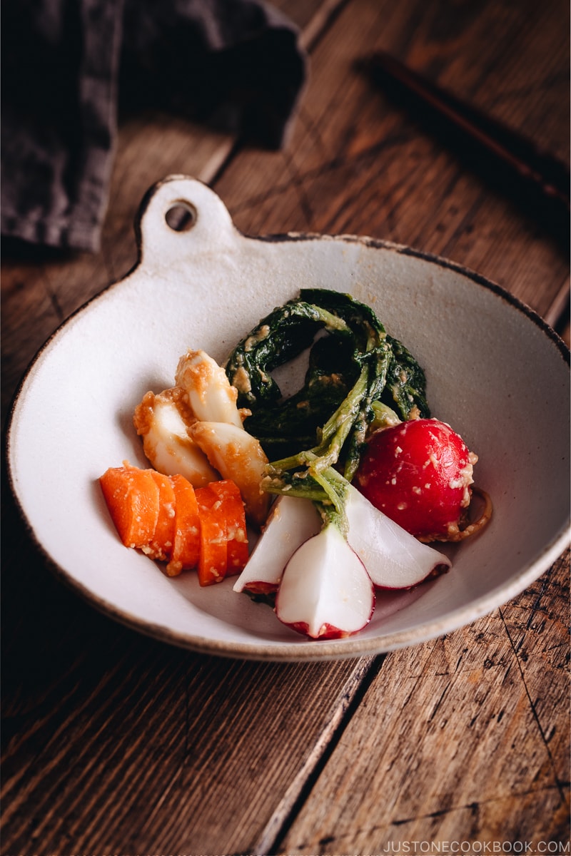 Carrot, radish, and garlic misozuke (miso pickles) in a white ceramic.