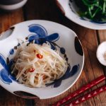 Spinach and Bean Sprout Namul in blue flower pattern dishes