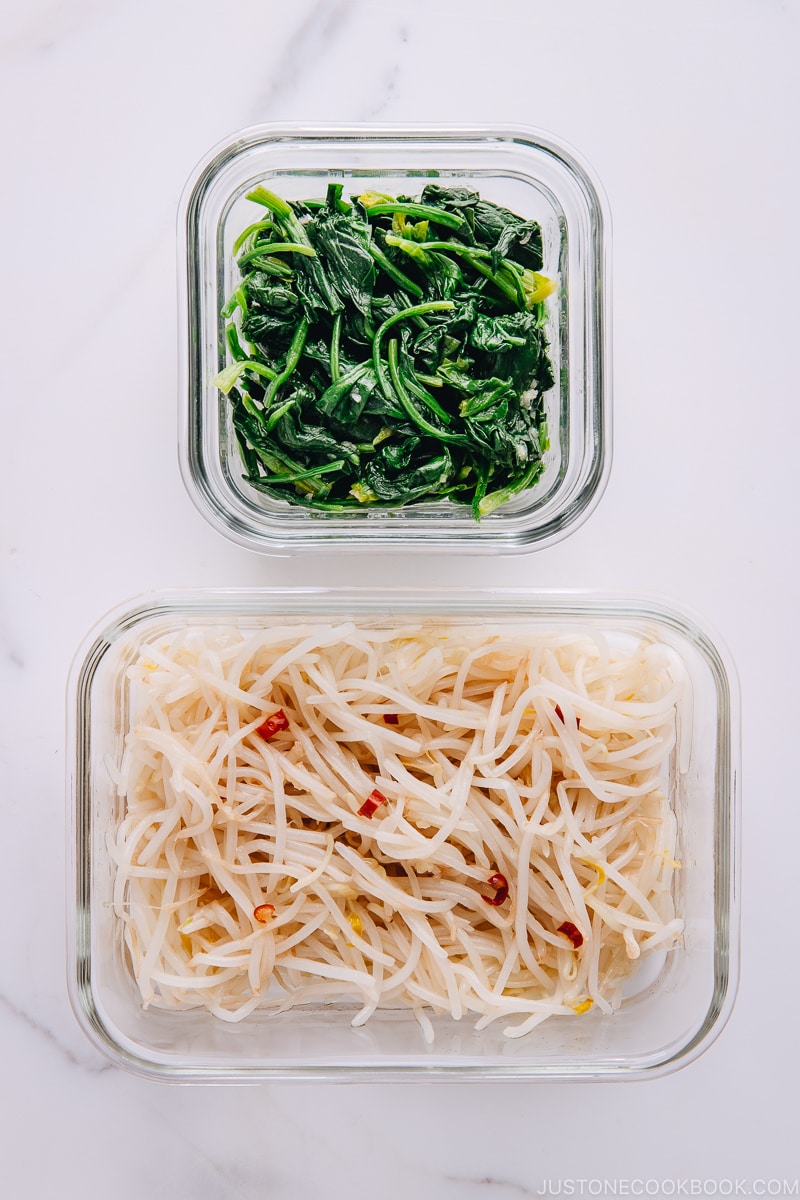 Spinach and Bean Sprout Namul in glass containers.