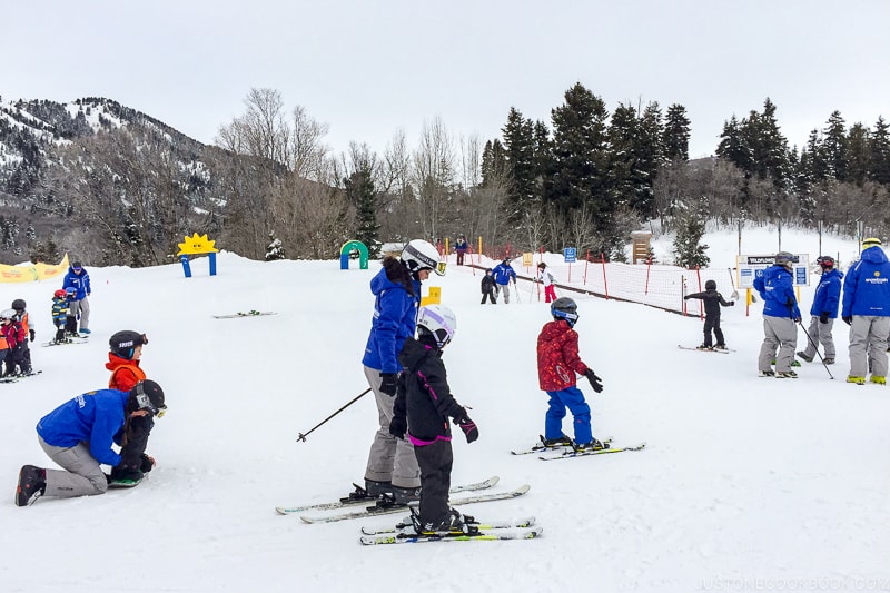 children at ski school at Snowbasin Resort - Ski Vacation Planning in Utah | www.justonecookbook.com