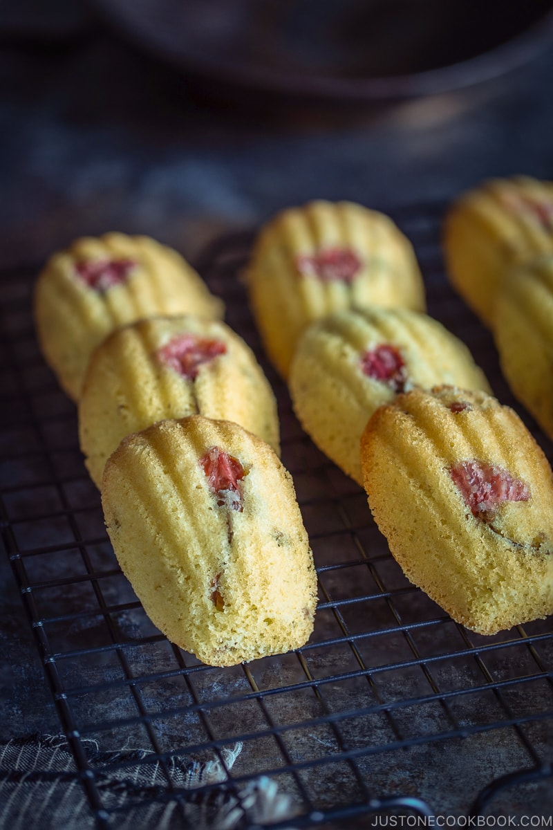 Cherry Blossom Madeleines on a wire rack.