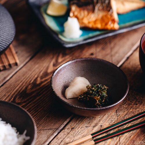 Japanese meal set with daikon leaves furikake and pickles in a small plate.