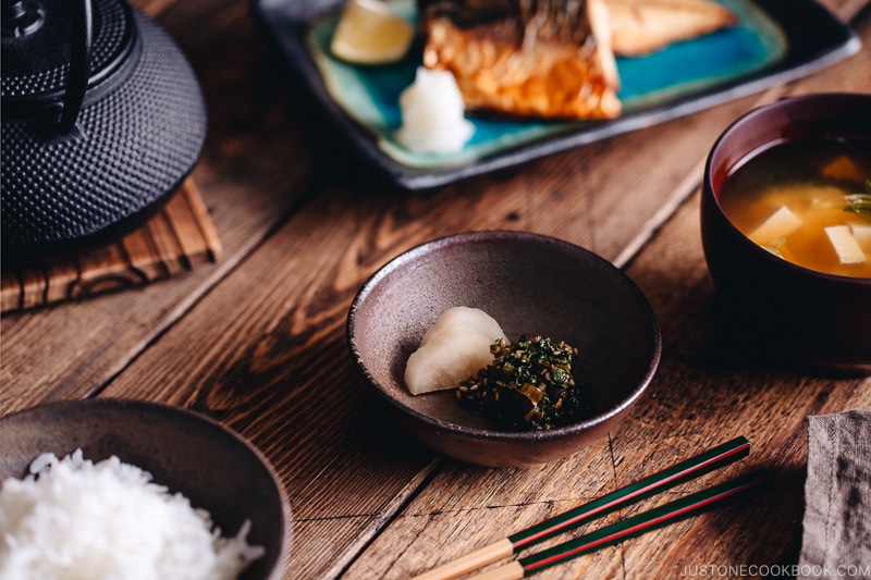 Japanese meal set with daikon leaves furikake and pickles in a small plate.