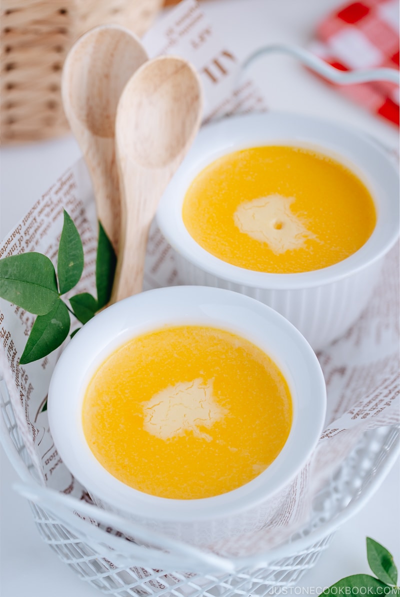 Silky soft and creamy Instant Pot Kabocha Flan on a white plate.