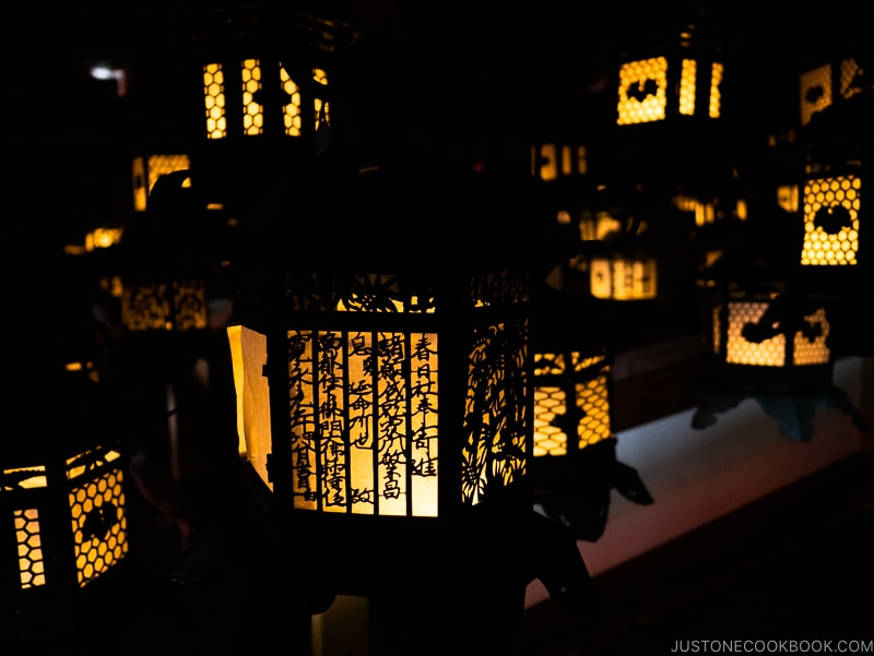 lit lanterns inside Fujinami-no-ya Hall - Nara Guide: Kasuga-taisha | www.justonecookbook.com