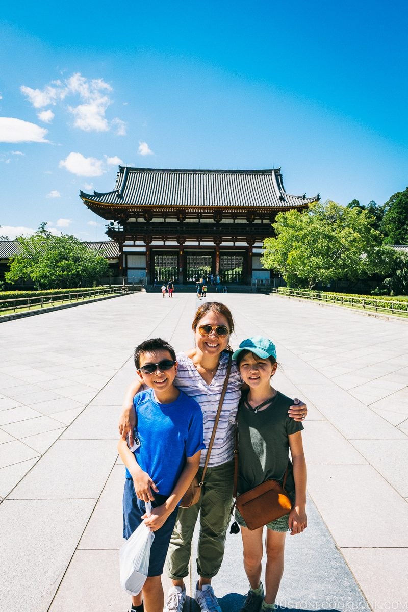 Two female and a male in front of Todaiji