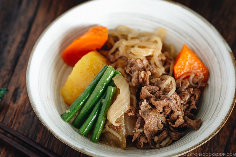 Pressure Cooker Instant Pot Nikujaga (Japanese Meat and Potato Stew) in a white bowl.