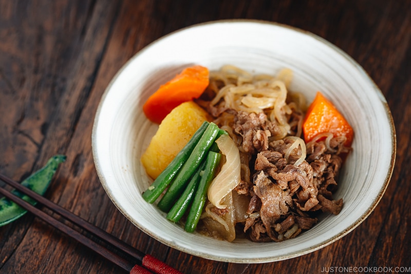 Pressure Cooker Instant Pot Nikujaga (Japanese Meat and Potato Stew) in a white bowl.