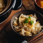 Bamboo rice in a bizen Japanese rice bowl and in a donabe (Japanese clay pot).