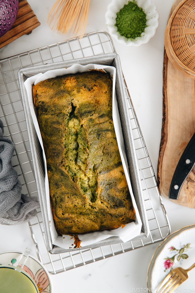 Matcha marble pound cake in a loaf pan.