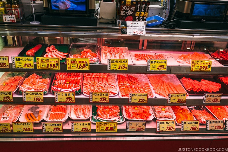 meat inside display case at Manno meat shop - Osaka Guide: Kuromon Ichiba Market and Kitchenware Street | www.justonecookbook.com