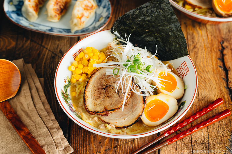 Miso ramen with homemade chashu and ramen egg garnished with nori.