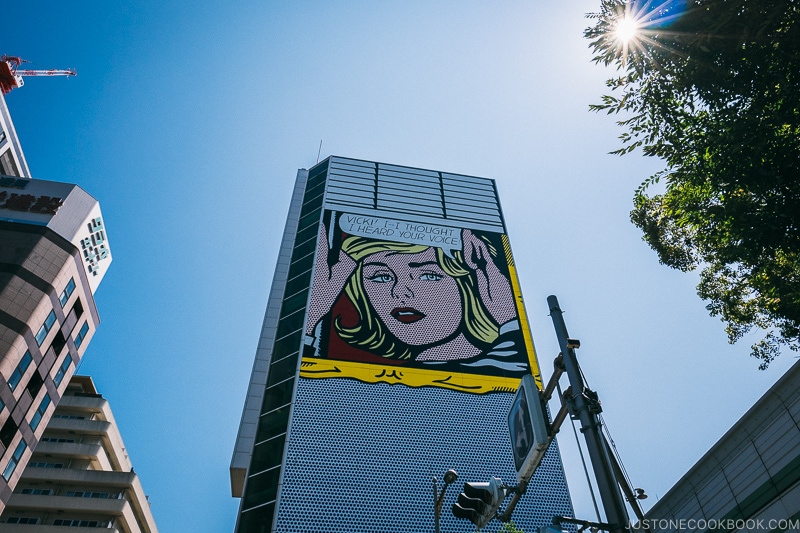 Vicki! I--I Thought I Heard Your Voice! by Roy Lichtenstein on a building