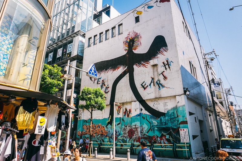 Peace on Earth by Seitaro Kuroda on a buiilding wall - Osaka Guide: Amerikamura & Shinsaibashi Shopping Street | www.justonecookbook.com