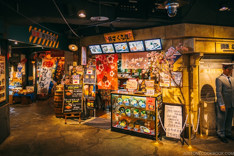 walkway and shops inside Naniwa Kushinbo Yokocho - Osaka Guide: Tempozan Harbor Village | www.justonecookbook.com