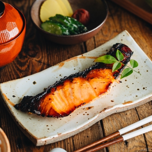 Salmon kasuzuke served on a Japanese plate.