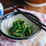 Spinach with sesame miso sauce in a Japanese ceramic bowl.