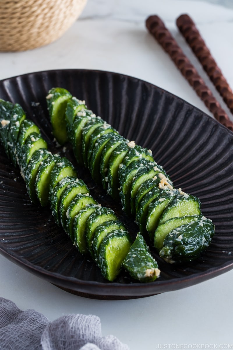 Kasuzuke (sake lees pickling) on a dark Japanese plate.