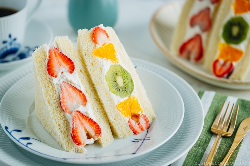 Japanese fruit sandwiches on a plate. Served with coffee.