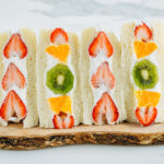Japanese Fruit Sandwiches on a wooden board.