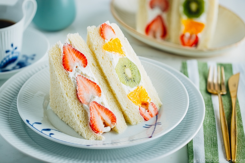 Japanese fruit sandwiches on a plate. Served with coffee.