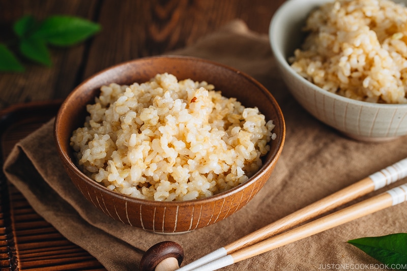 Rice bowls containing perfectly cooked short grain brown rice.